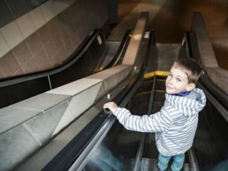 Self Reliance Boosting Activities Kid On Escalator