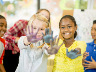 Kids playing and painting at summer camp. summer camp is open